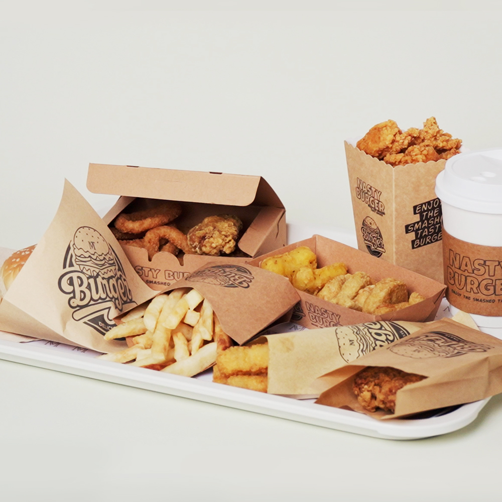 Single pass printer application for branded cartons, fast food packaging, and repeatable version control